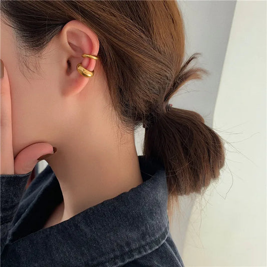 2 piezas aretes envolventes chapados en oro de 18 k