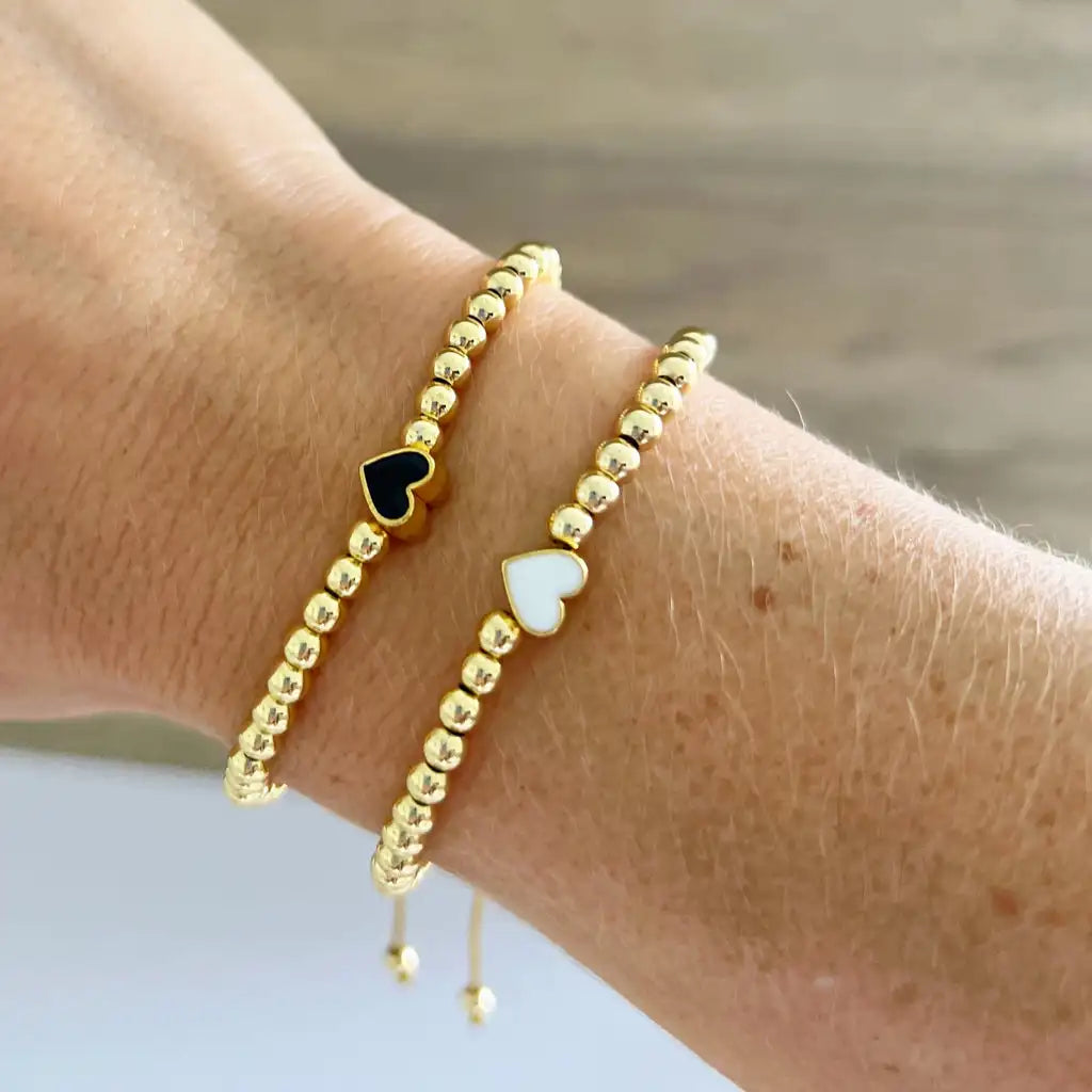 Pulsera con dije de corazón chapada en oro de 18 quilates con cuentas elásticas